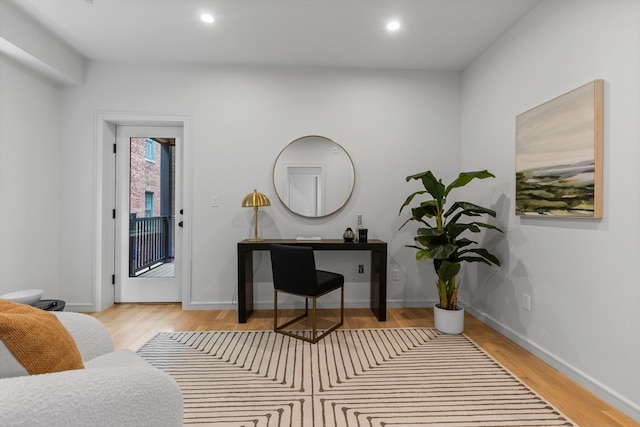 office area with light wood-type flooring