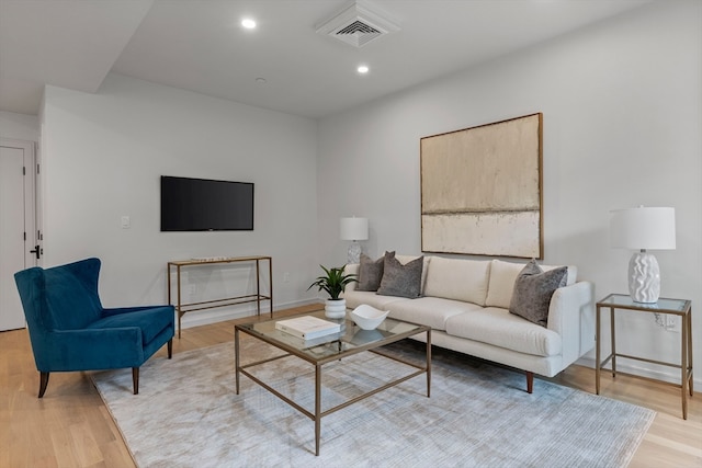 living room with light hardwood / wood-style floors