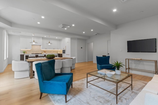 living room with light hardwood / wood-style floors