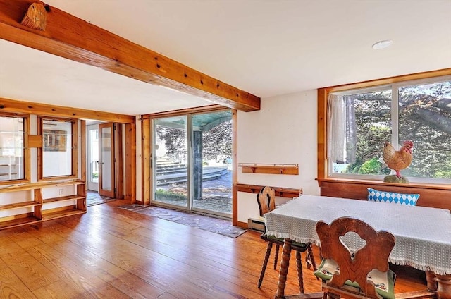 2386 Pleasant, Dighton, MA 02715 - dining space featuring wood finished floors, baseboard heating, and beamed ceiling