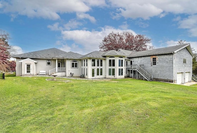 2386 Pleasant, Dighton, MA 02715 - rear view of house featuring stairs, a garage, and a yard