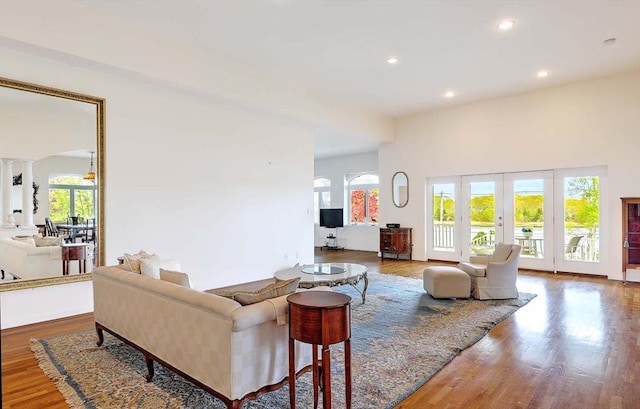 2386 Pleasant, Dighton, MA 02715 - living room with wood finished floors, recessed lighting, and french doors
