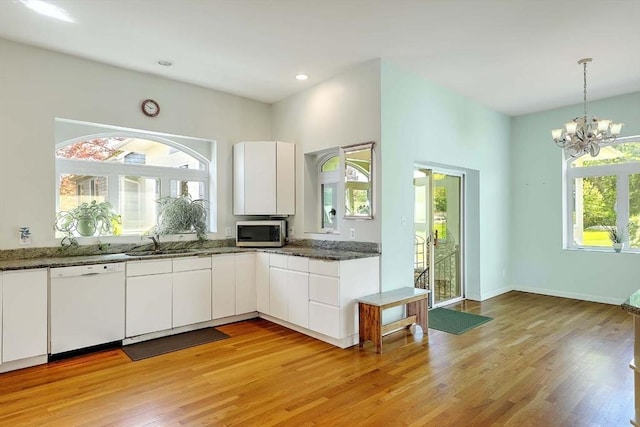 2386 Pleasant, Dighton, MA 02715 - kitchen with white dishwasher, stainless steel microwave, a sink, light wood finished floors, and recessed lighting