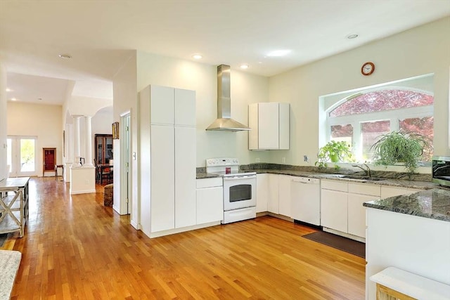 2386 Pleasant, Dighton, MA 02715 - kitchen featuring wall chimney exhaust hood, white appliances, a sink, and light wood-style floors