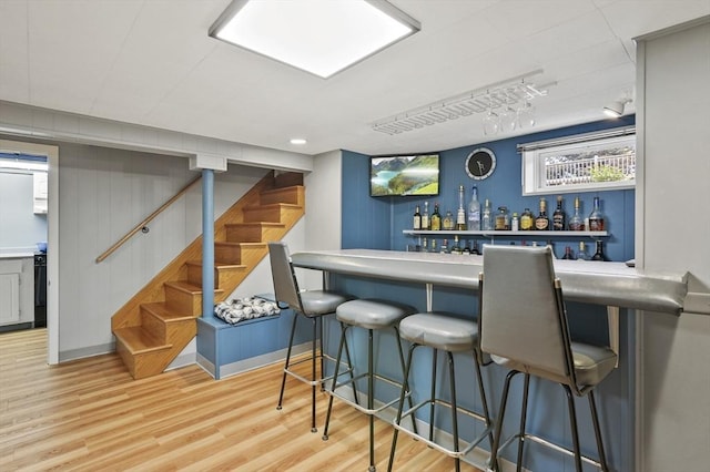 4 Polito Dr, Worcester, MA 01604 - indoor dry bar featuring stairs, wood finished floors, and baseboards