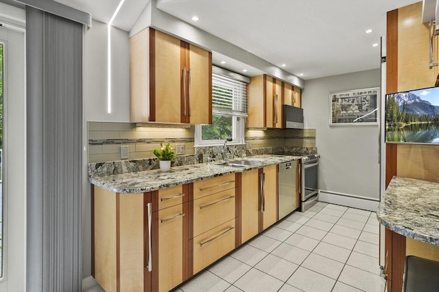 4 Polito Dr, Worcester, MA 01604 - kitchen with a sink, dishwasher, light tile patterned floors, baseboards, and tasteful backsplash