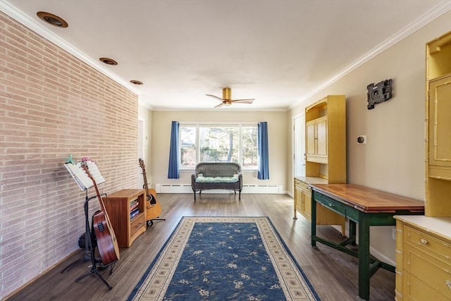 sitting room featuring crown molding, dark wood-type flooring, ceiling fan, a baseboard heating unit, and brick wall