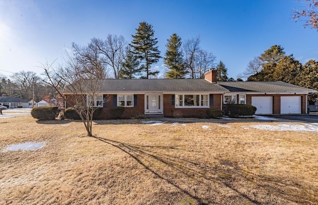 ranch-style home with a garage