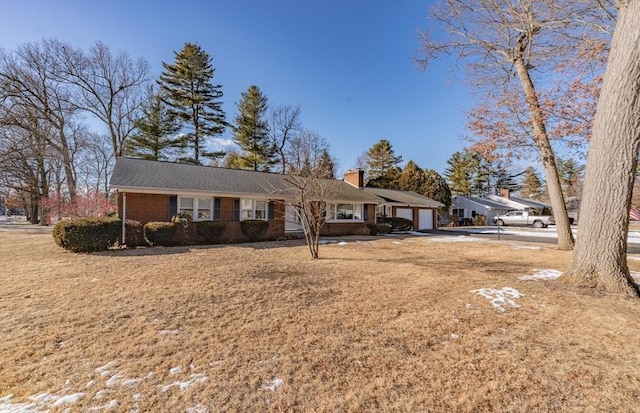 ranch-style home with a garage