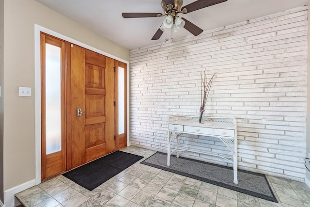 foyer with brick wall