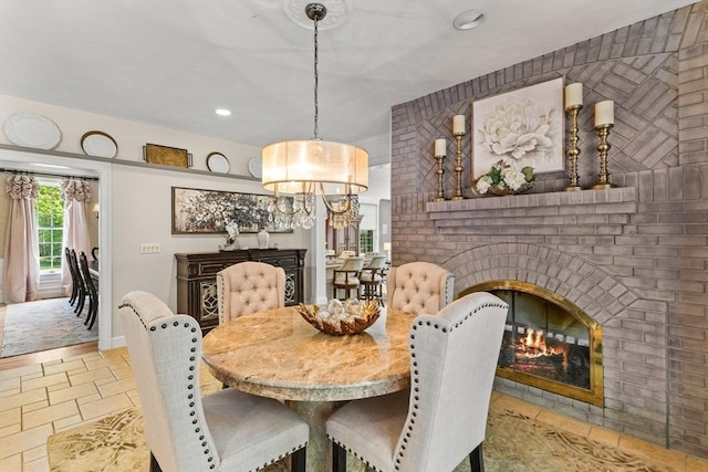 8 Riverside Ter, Easton, MA 02356 - dining area featuring a brick fireplace, a chandelier, recessed lighting, and baseboards