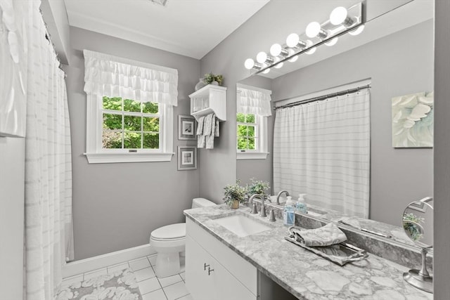 8 Riverside Ter, Easton, MA 02356 - full bath featuring healthy amount of natural light, vanity, toilet, and baseboards