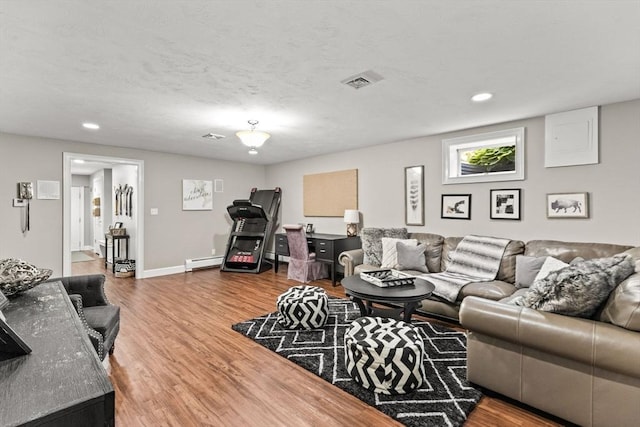 8 Riverside Ter, Easton, MA 02356 - living area with wood finished floors, a baseboard radiator, recessed lighting, and baseboards