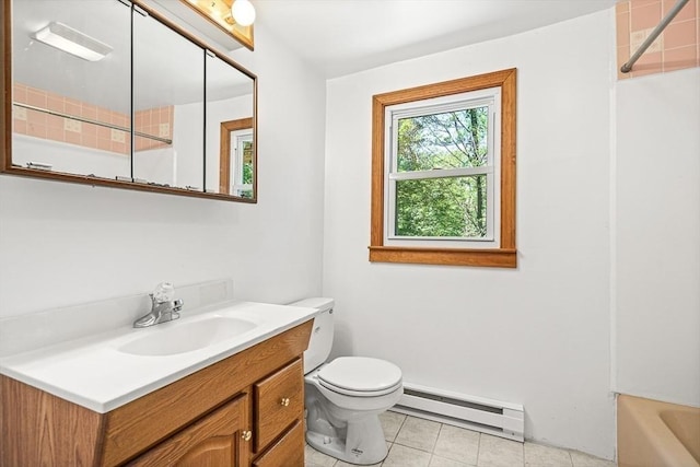 98 G St, Dracut, MA 01826 - full bath with a baseboard heating unit, vanity, toilet, and tile patterned flooring