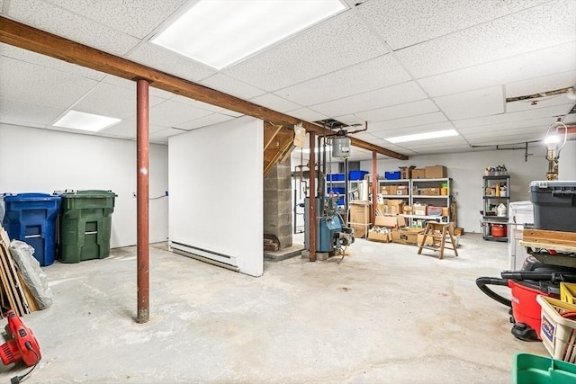 98 G St, Dracut, MA 01826 - below grade area with a drop ceiling, a baseboard heating unit, and a heating unit
