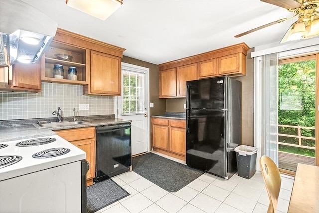 98 G St, Dracut, MA 01826 - kitchen featuring black appliances, a sink, a ceiling fan, tasteful backsplash, and brown cabinetry