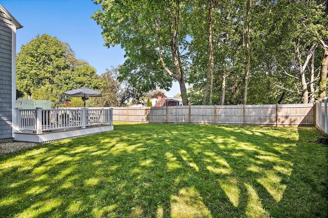 view of yard with a deck