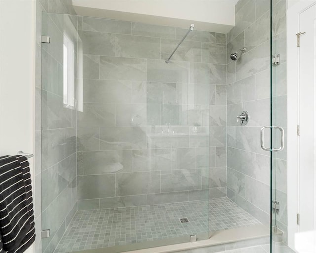 bathroom featuring a stall shower