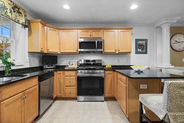 18 Dale St Unit 7A, Andover, MA 01810 - kitchen with stainless steel appliances, ornate columns, a peninsula, recessed lighting, and dark stone counters