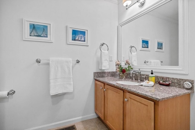 18 Dale St Unit 7A, Andover, MA 01810 - bathroom featuring ornamental molding, vanity, tile patterned floors, and baseboards
