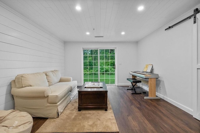 18 Dale St Unit 7A, Andover, MA 01810 - living area with a barn door, recessed lighting, dark wood-style floors, and baseboards