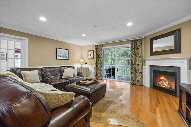 18 Dale St Unit 7A, Andover, MA 01810 - living room with wood finished floors, recessed lighting, a glass covered fireplace, and ornamental molding