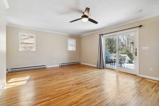 unfurnished room featuring light wood finished floors, a baseboard heating unit, and crown molding