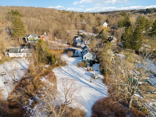 aerial view featuring a view of trees