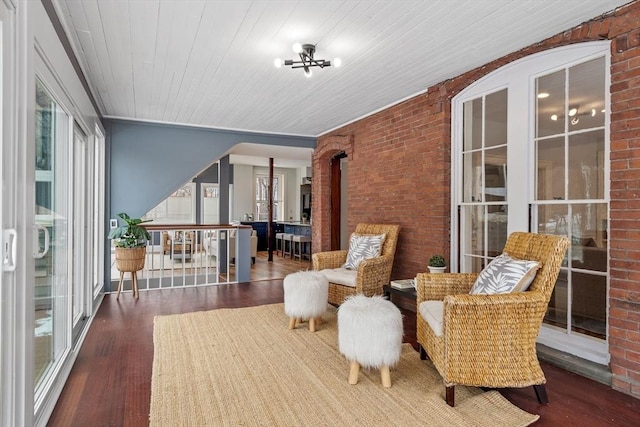 interior space with wood ceiling and plenty of natural light