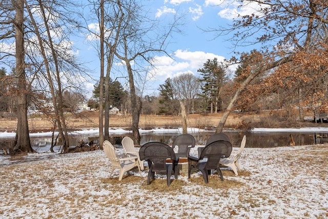 view of yard layered in snow