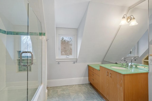 bathroom featuring vanity and a tile shower