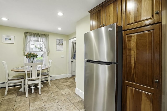 13 Delaval Rd, Worcester, MA 01606 - kitchen with freestanding refrigerator, recessed lighting, baseboards, and light tile patterned flooring