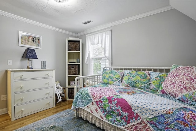 13 Delaval Rd, Worcester, MA 01606 - bedroom with light wood-type flooring and crown molding