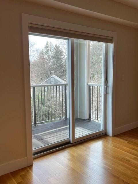 321 Hammond Pond Pkwy Unit U301, Brookline, MA 02467 - entryway featuring baseboards and light wood-type flooring