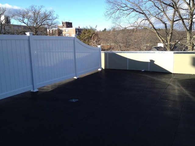 321 Hammond Pond Pkwy Unit U301, Brookline, MA 02467 - view of patio / terrace featuring fence