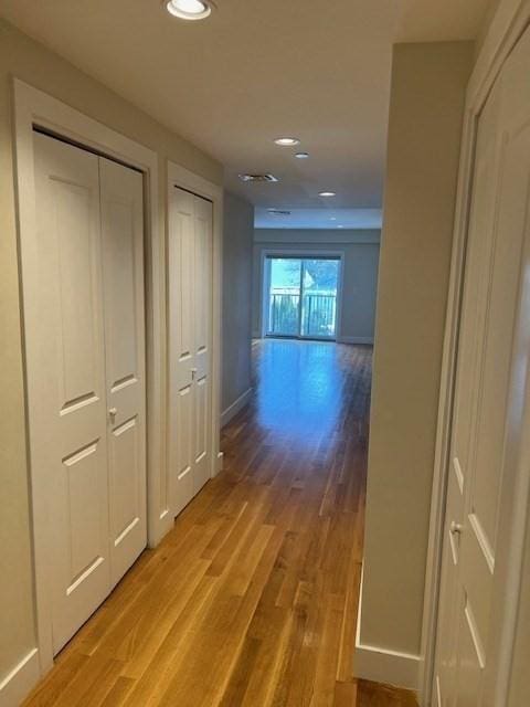 321 Hammond Pond Pkwy Unit U301, Brookline, MA 02467 - corridor with wood finished floors, recessed lighting, and baseboards