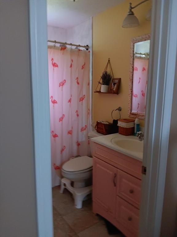 16 Heather Ln Unit 16, Bridgewater, MA 02324 - bathroom with vanity, a shower with shower curtain, and tile patterned flooring