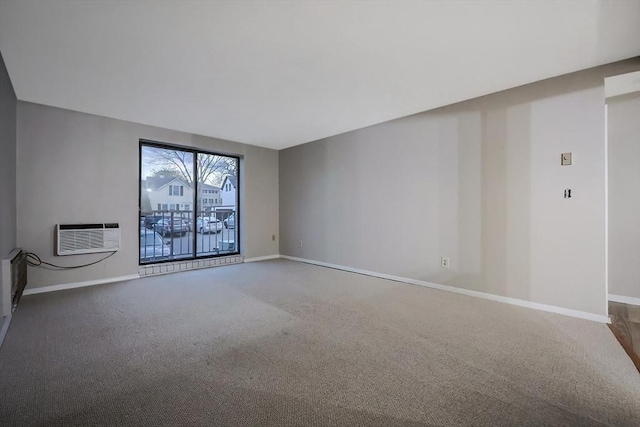 carpeted empty room with an AC wall unit