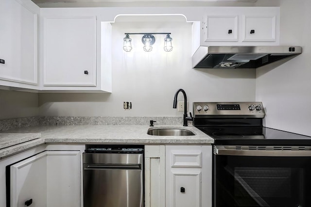 kitchen featuring electric stove, extractor fan, and white cabinets