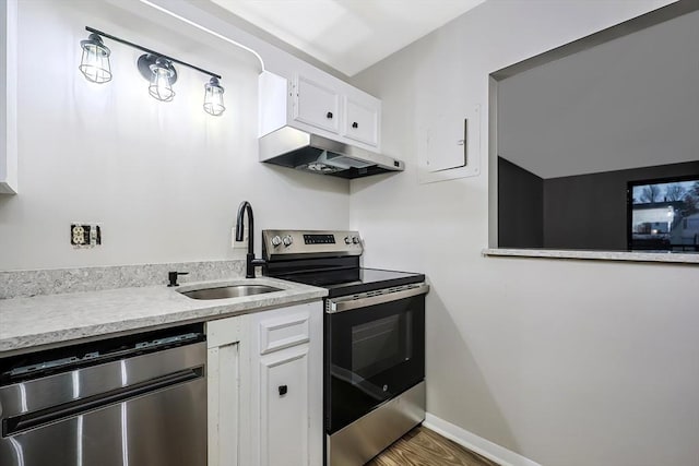 kitchen with dishwashing machine, sink, white cabinetry, stainless steel electric range oven, and dark hardwood / wood-style flooring