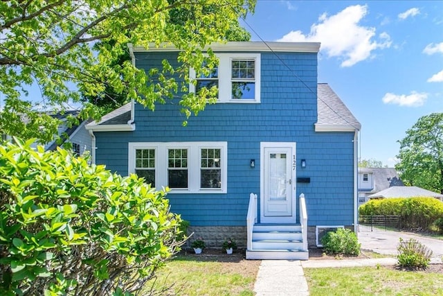 127 Mutton Ln, Weymouth, MA 02189 - view of front of house featuring fence and roof with shingles