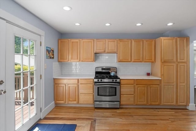 127 Mutton Ln, Weymouth, MA 02189 - kitchen featuring stainless steel range with gas stovetop, light brown cabinets, light countertops, and recessed lighting