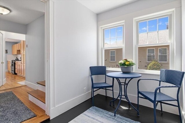 127 Mutton Ln, Weymouth, MA 02189 - sitting room with light wood-type flooring and baseboards