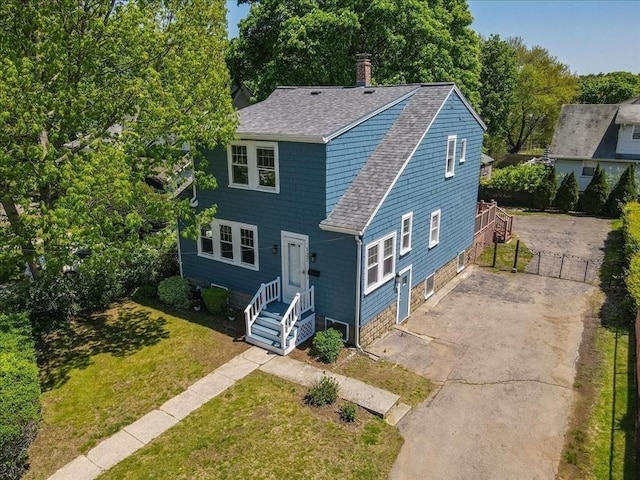 127 Mutton Ln, Weymouth, MA 02189 - view of front of house with roof with shingles and a chimney