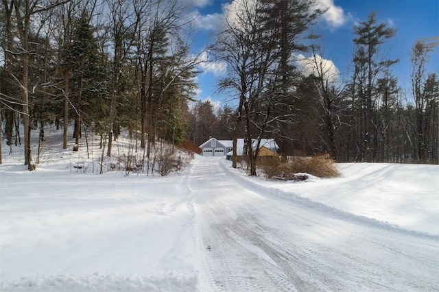 view of yard layered in snow