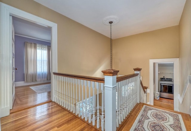 hallway featuring hardwood / wood-style flooring