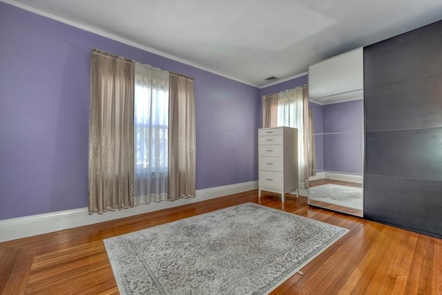 bedroom with light hardwood / wood-style flooring