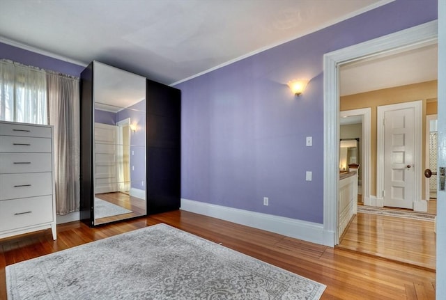 unfurnished bedroom featuring hardwood / wood-style floors