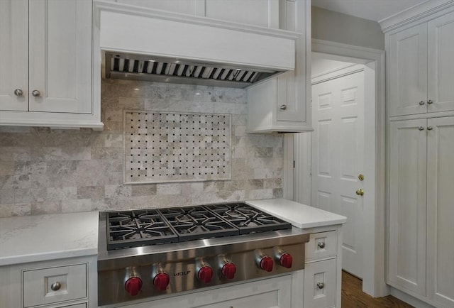 11 Edge Hill Rd, Hopkinton, MA 01748 - kitchen featuring stainless steel gas stovetop, range hood, backsplash, white cabinets, and light stone countertops