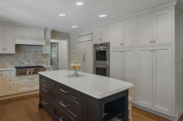 11 Edge Hill Rd, Hopkinton, MA 01748 - kitchen featuring appliances with stainless steel finishes, light countertops, white cabinetry, and recessed lighting